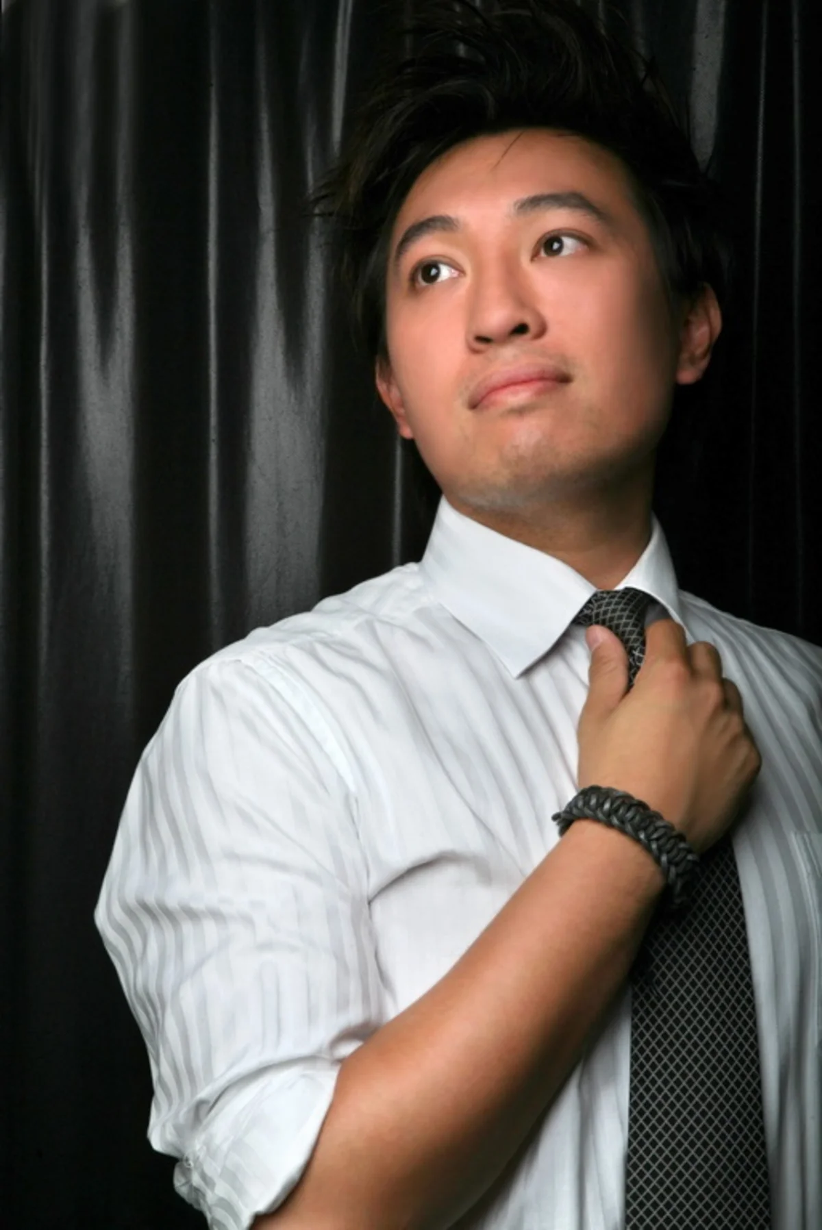 AJ portrait, seated studio shot