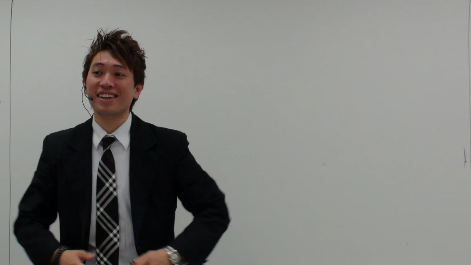 AJ presenting to an audience